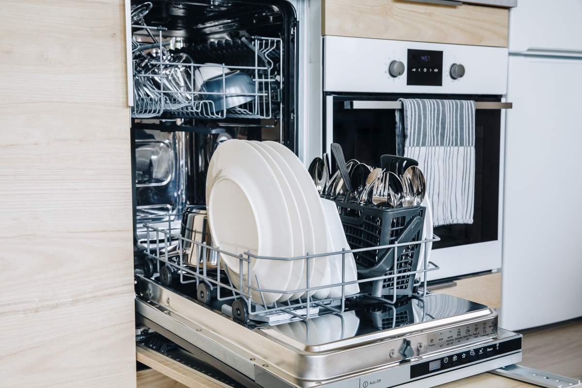 open-dishwasher-with-white-clean-dishes-after-wash-2025-03-18-15-31-34-utc GE Dishwasher Repair